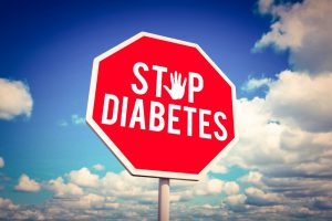 Stop diabetes against scenic view of blue sky